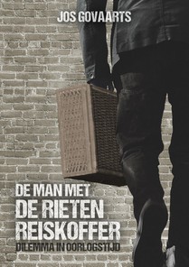 De man met de rieten reiskoffer